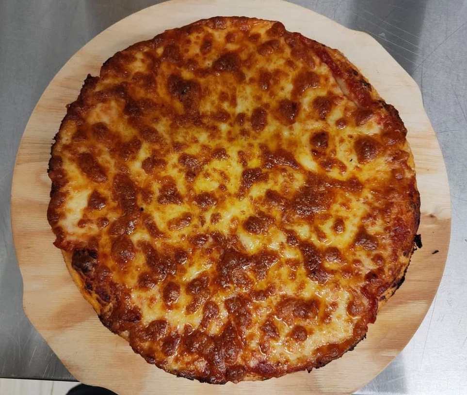 Margherita appena sfornata Pizza margherita appena sfornata – Margherita appena sfornata | La Terrazza Pignola